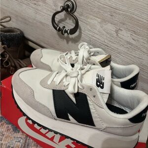New Balance Women's Sneakers in White and Black